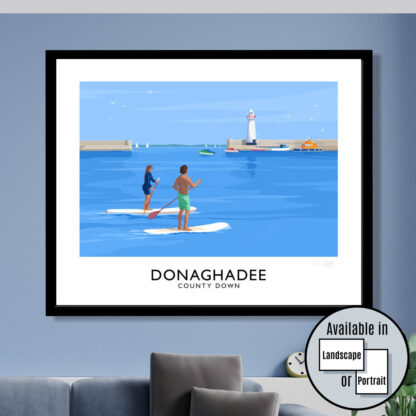 A vintage style travel paddleboards at Donaghadee Harbour, County Down.